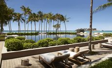 Exterior view of the hotel showing the pool with the sea in view