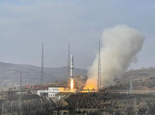 A Chinese Long March 6 rocket lifts off from Taiyuan Satellite Launch Center carrying SDGSAT-1 on Nov. 4, 2021.