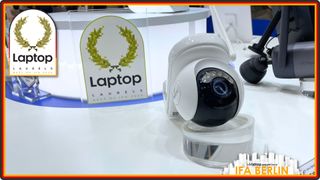 The Reolink Altas PT Ultra smart home security camera on display at IFA Berlin 2024 with a Laptop Laurels award trophy