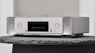 Marantz CD50n streaming CD player on a nice slate table in a white room