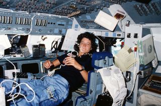 Sally Ride floats in space on STS-7 mission.