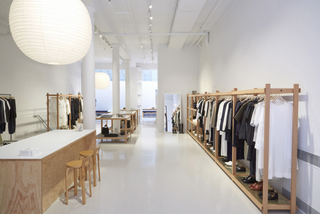 White interior of La Garconne fashion store New York