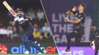 Virat Kohli of India and Trent Boult of New Zealand