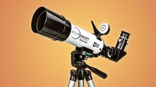 Celestron solar telescope on an orange background