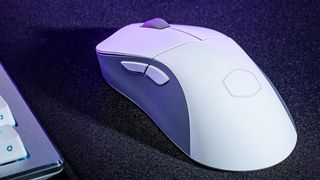 Cooler Master MM731 gaming mouse on a desk.