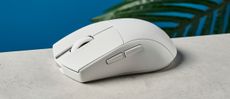 Photograph of Redragon M916 Pro mouse in white