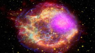 New images from NASA&#039;s Fermi Gamma-ray Space Telescope show where supernova remnants emit radiation a billion times more energetic than visible light. The images bring astronomers a step closer to understanding the source of some of the universe&#039;s most energetic particles -- cosmic rays. This composite shows the Cassiopeia A supernova remnant across the spectrum: Gamma rays (magenta) from NASA&#039;s Fermi Gamma-ray Space Telescope; X-rays (blue, green) from NASA&#039;s Chandra X-ray Observatory; visible light (yellow) from the Hubble Space Telescope; infrared (red) from NASA&#039;s Spitzer Space Telescope; and radio (orange) from the Very Large Array near Socorro, N.M. 