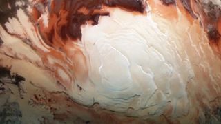 spacecraft image showing a closeup of the ice cap at Mars' south pole