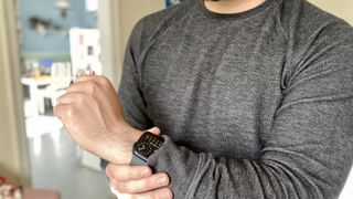 A man using Apple Watch tips and tricks