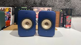 KEF LSX II speakers in blue finish on desk