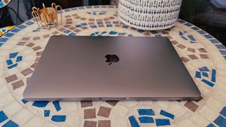 M2 Macbook Pro 13 Inch Closed With Apple Logo Displayed