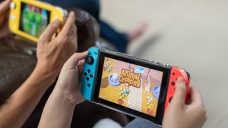 Animal crossing game popular Nintendo switch with joy controllers family friend activity playing together.