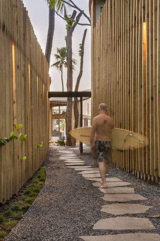 beachfront house al suave in el salvador showing indoor outdoor areas and swimming pools, and bamboo construction