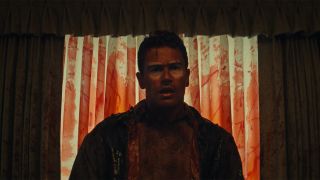 Theo James covered in blood in The Monkey