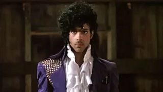 The Kid (Prince) staring intently in Purple Rain