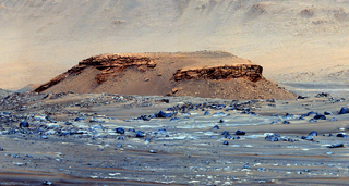 This structure of boulders and sediment shows the geological history of the delta.