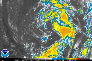 This satellite image of the large disturbance centered east of Bermuda in the Atlantic Ocean.