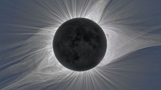 The sun's tenuous corona shines brightly during a total solar eclipse.