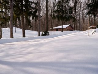 Reigo & Bauer HQ in woods in snow