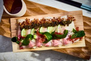 Wooden board of food