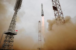 A Russian Proton rocket launches the European Space Agency's ExoMars 2016 orbiter and lander into space from Baikonur Cosmodrome, Kazakhstan on March 14, 2016.