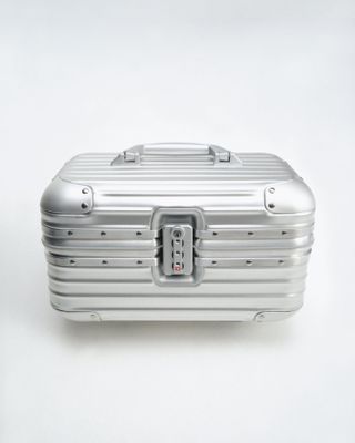 A closed Rimowa aluminium vanity case in silver