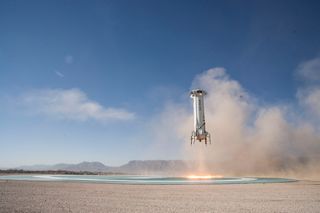 Blue Origin's New Shepard 2.0 booster aces its touchdown on Dec. 12, 2017.