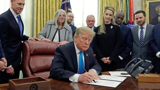 President Donald Trump signs Space Policy Directive-4 in the Oval Office of the White House on Feb. 19, 2019. SPD-4 directs the Pentagon to establish a Space Force.