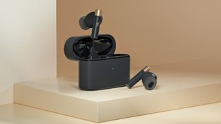 1More PistonBuds Pro Q30 black earbuds open case.