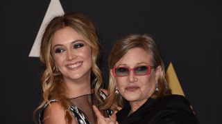 Billie Lourd and Carrie Fisher posing on the carpet for the 7th annual Governors Awards