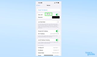 A screenshot showing how to copy and paste passwords from the Wi-Fi network menu in iOS 16