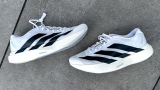 Adidas Adizero Evo SL on a sidewalk