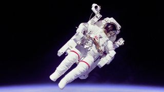 NASA astronaut Bruce McCandless II ventured further away from the confines and safety of his ship than any previous astronaut ever has when he tested the Manned Manned Manuevering Unit or MMU, a nitrogen jet propelled backpack, during a 1984 space shuttle mission. 