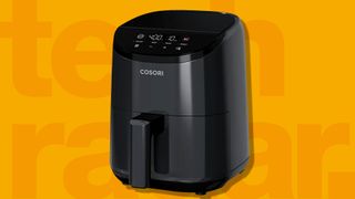 The best small air fryer, Cosori Lite Airfryer, on an orange background