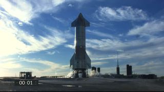 SpaceX's Starship SN8 rocket prototype stands atop its test stand at the company's Boca Chica, Texas facility during an attempted high-altitude launch test on Dec. 8, 2020. 