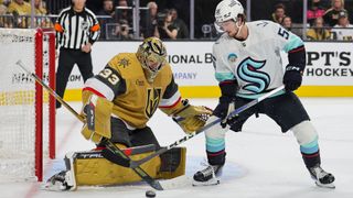 Adin Hill (L) saves from Kailer Yamamoto (R) ahead of the Golden Knights vs Kraken live stream