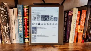 Goodreads app on the Amazon Kindle Scribe, sitting on a bookshelf.