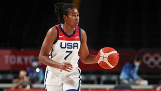 The USA&#039;s Ariel Atkins dribbles the ball during her team&#039;s match against Serbia at the Tokyo Olympics in 2021.