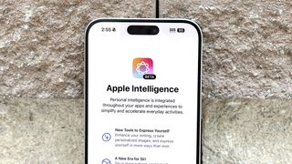 Apple Intelligence installation screen shown on iPhone 15 Pro Max.