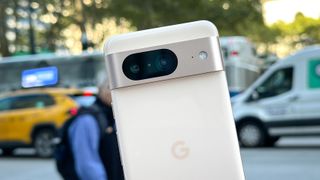 Google Pixel 8 shown held in hand