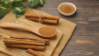 Cinnamon on wooden board