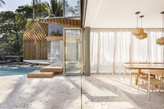 beachfront house al suave in el salvador showing indoor outdoor areas and swimming pools, and bamboo construction