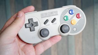 8BitDo controller in hand