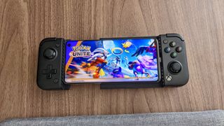 Gamesir X2 Pro with Pokemon Unite on phone