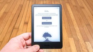 Amazon Kindle (2022) held close to the camera to show the login screen