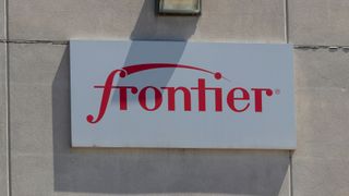 The Frontier logo on a building