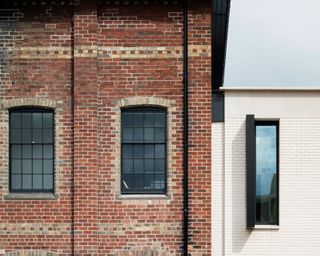 The old building has been cleaned up, and a new extension added