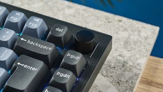 A Keychron V1 wired mechanical keyboard, in the frosted black (translucent) colorway