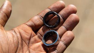 RingConn Smart Ring and Oura Ring in hand