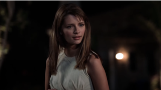 Mischa Barton is Marissa Cooper in driveway during The OC's pilot.